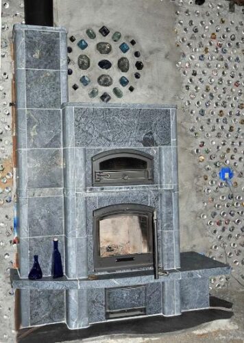 Off-Grid Earthship Home Powered by Sun and Tulikivi Fireplace
